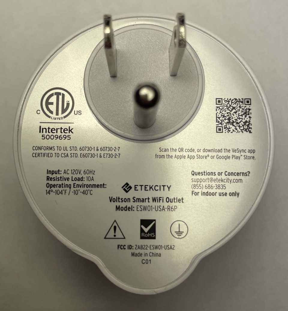 A back view of the Etekcity Voltson ESW01-USA-R6P Smart Outlet, displaying the sticker with all its product details.